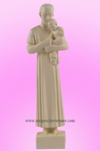 statue faite d'ivoirine de Saint Joseph portant l'Enfant Jésus